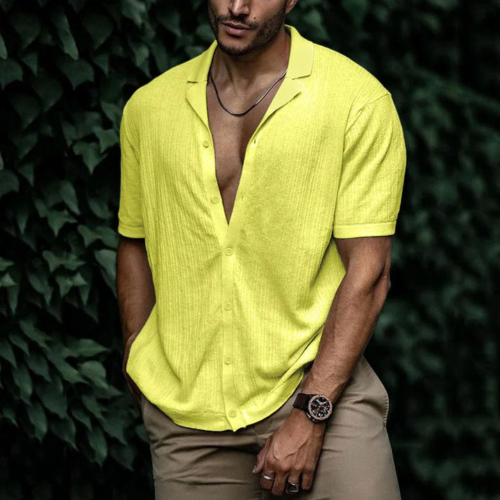 Men's short sleeve shirt styled open at the collar for relaxed look