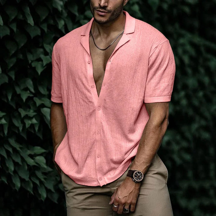 Casual men's camp collar shirt paired with chinos for everyday wear