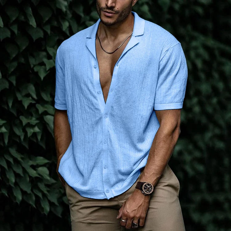 Side view of men's camp collar shirt showing relaxed fit and short sleeve construction