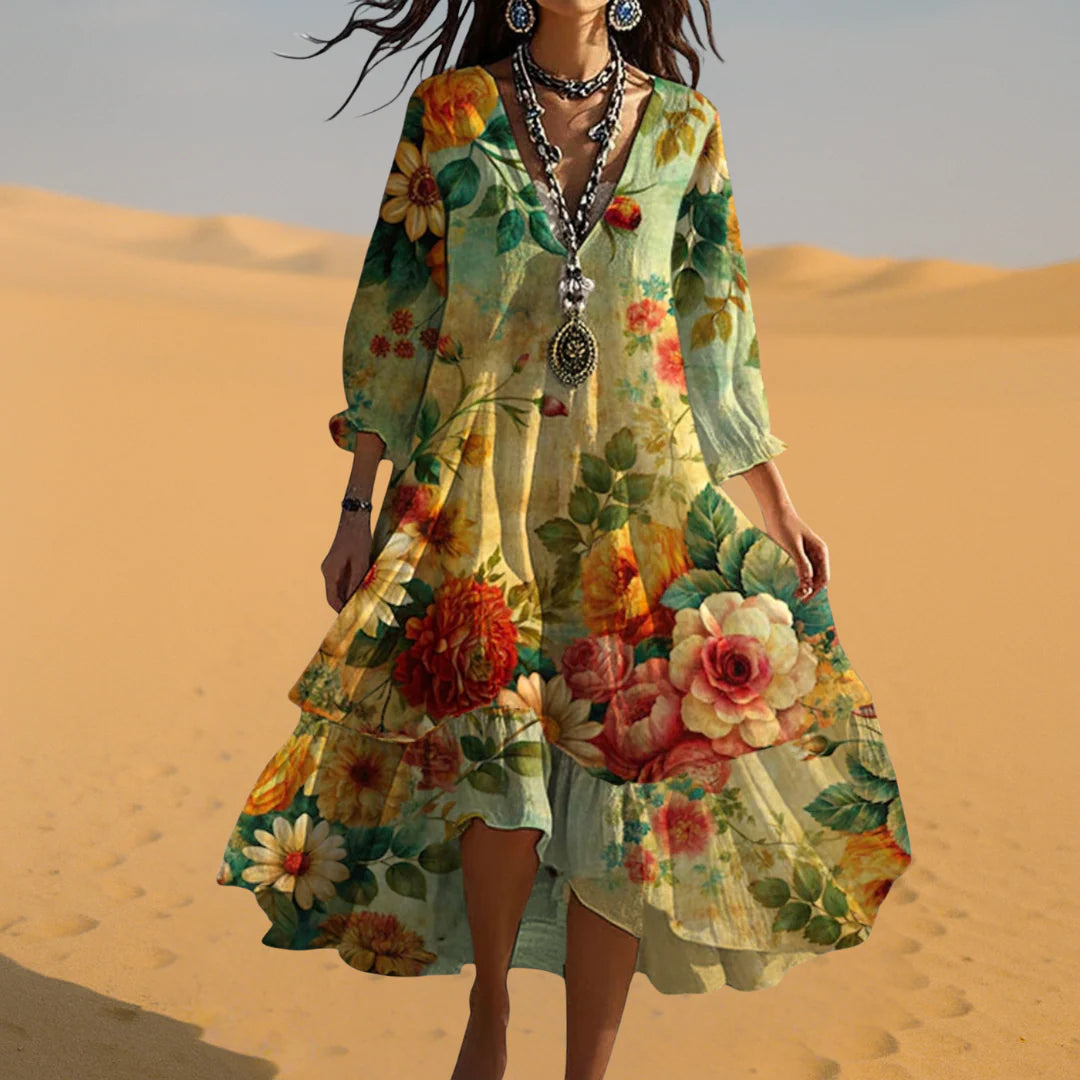 Full-length view of tiered hem floral midi dress with relaxed flowing silhouette