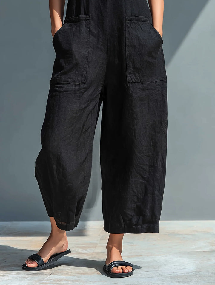 Loose-fitting women's jumpsuit with textured fabric and comfortable drape for summer occasions