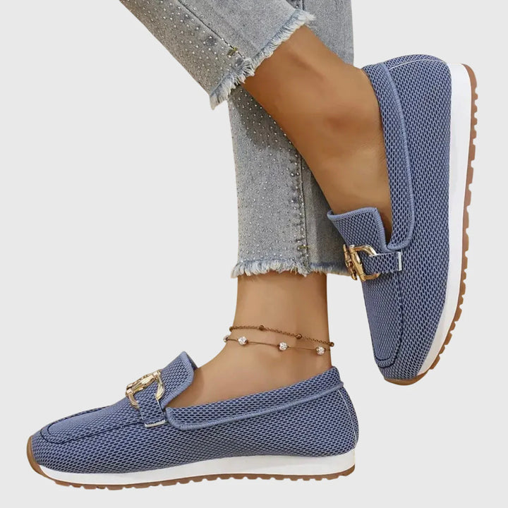 Detailed view of women's orthopedic loafers featuring cushioned insole and non-slip rubber tread pattern