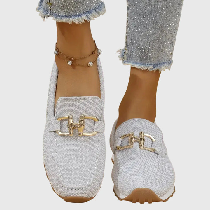 Women's orthopedic loafers in motion demonstrating flexible sole and secure fit for everyday wear
