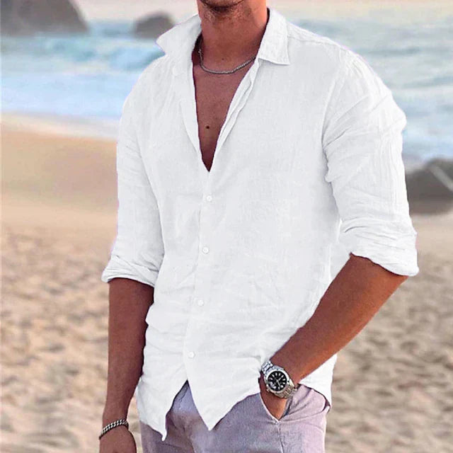 Detail shot of men's linen shirt button closure and textured fabric