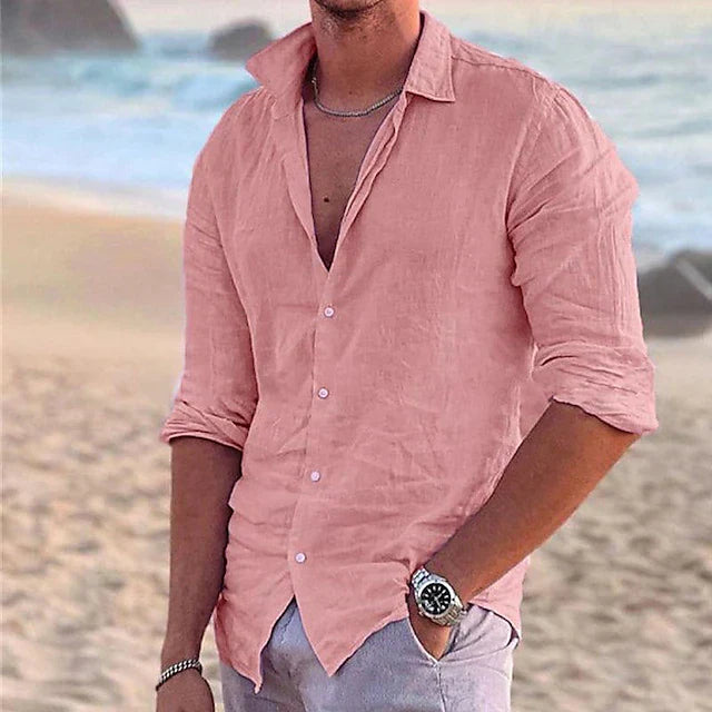 Man styling men's button-up linen shirt with casual pants for warm weather