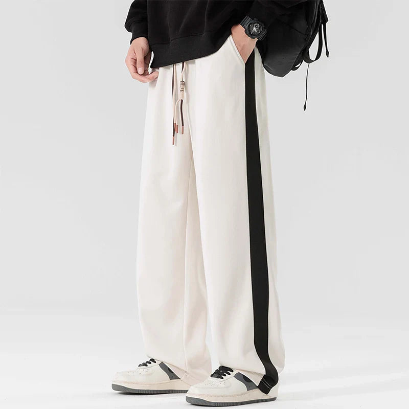 Men's wide leg sweatpants showing soft fabric drape and comfortable stretch fit