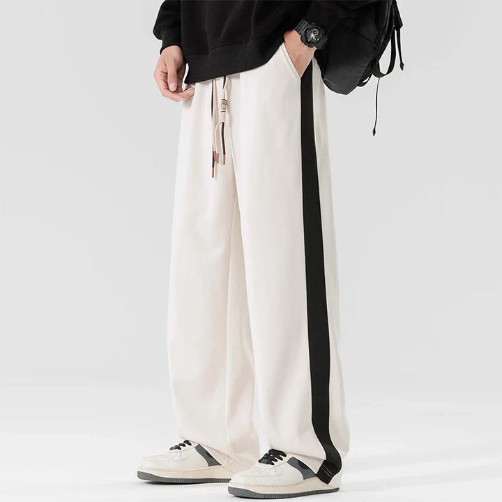 Men's wide leg sweatpants showing soft fabric drape and comfortable stretch fit