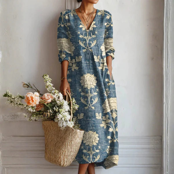 Linen Midi Dress with vintage floral print in blue and cream, featuring a v-neckline and three-quarter sleeves for a relaxed fit