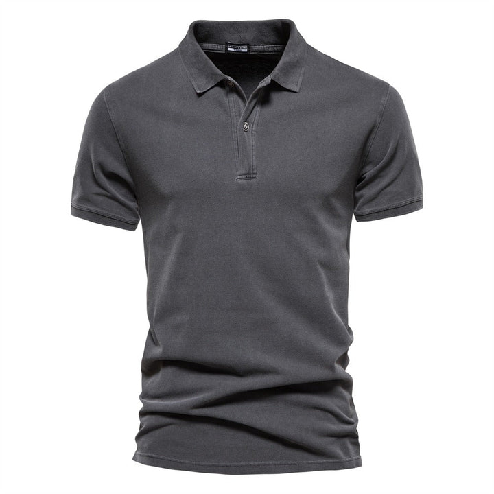 Close-up of Men's Slim Fit Polo Shirt Cotton Short Sleeve showing smooth fabric texture and tailored fit through the torso