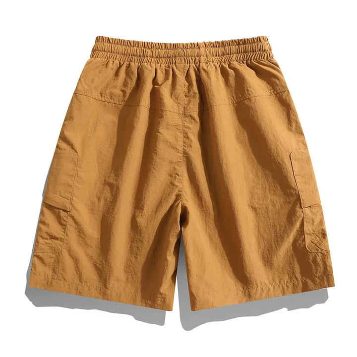 Back view of men's cargo chino shorts displaying elastic waistband and relaxed silhouette