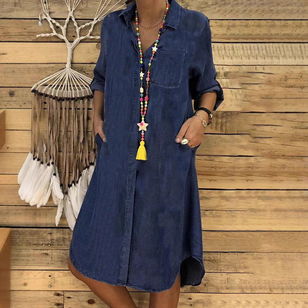 Woman styling Denim Shirt Dress with rolled sleeves and relaxed silhouette