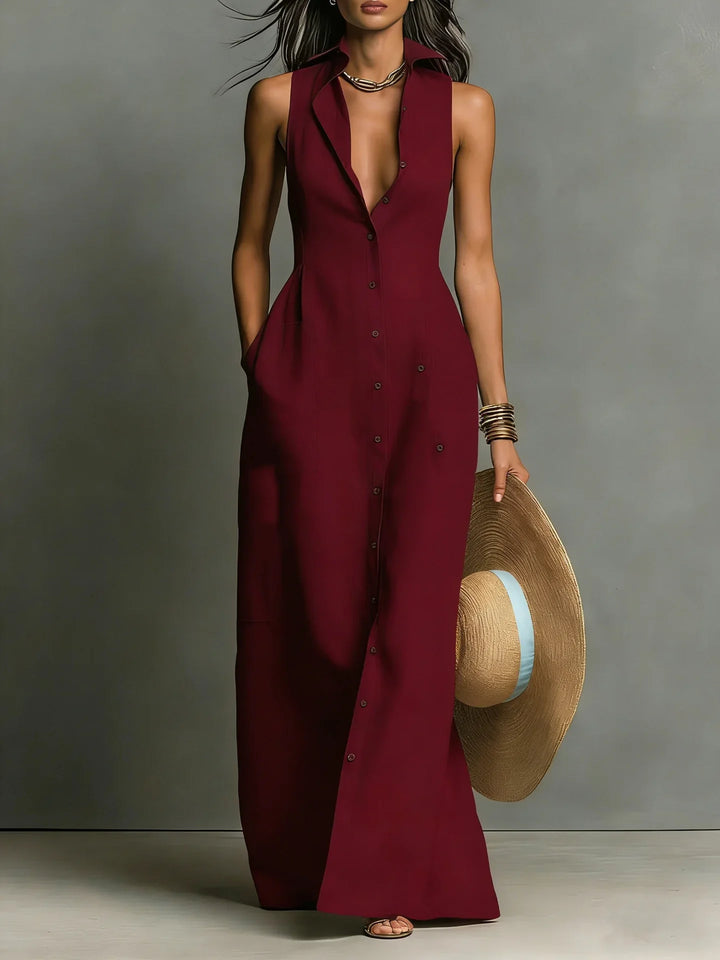 Side view of lapel collar maxi shirt dress showing fitted waist and flowing skirt silhouette