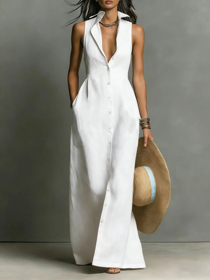 Back view of red maxi shirt dress with structured bodice and smooth drape to floor