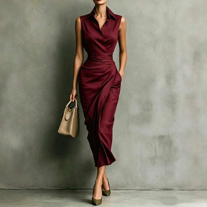 Full-length view of midi dress with wrap silhouette and fluid skirt draping to mid-calf
