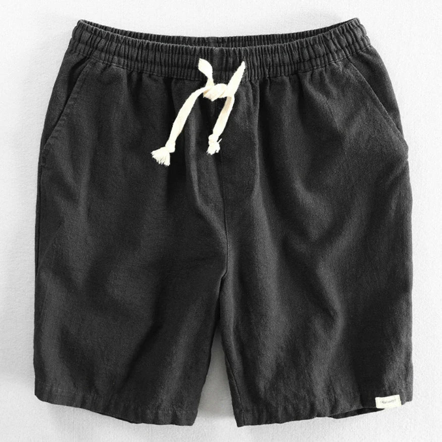 Side view of men's relaxed fit chino shorts with deep pockets and mid-thigh length cut
