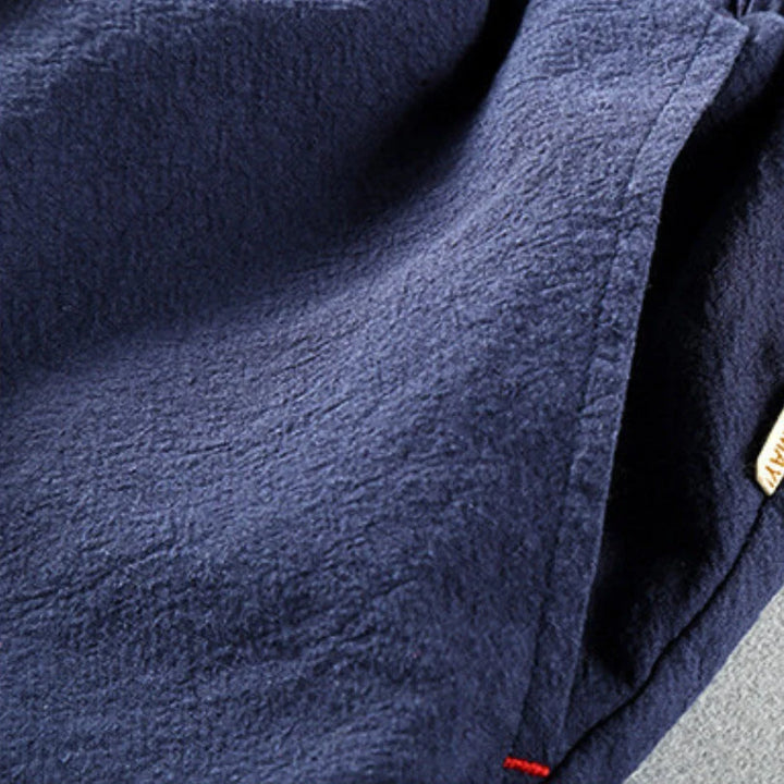 Detail shot of textured fabric and side pocket construction on men's chino shorts