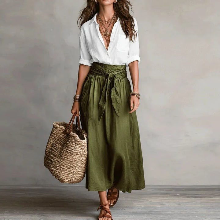 Side angle of Linen Co-Ord Set displaying natural drape and midi length skirt with tie detail