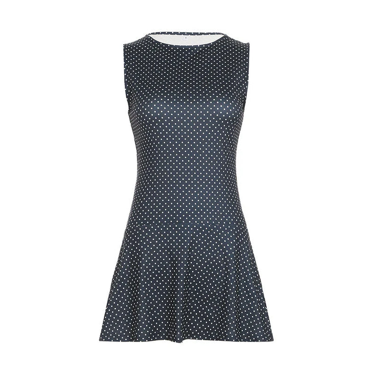 Flared hem detail on sleeveless polka dot mini dress blue showing movement and drape
