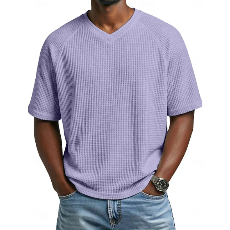 Front view of men's V-neck waffle texture short sleeve tShirt in light blue showing ribbed fabric detail