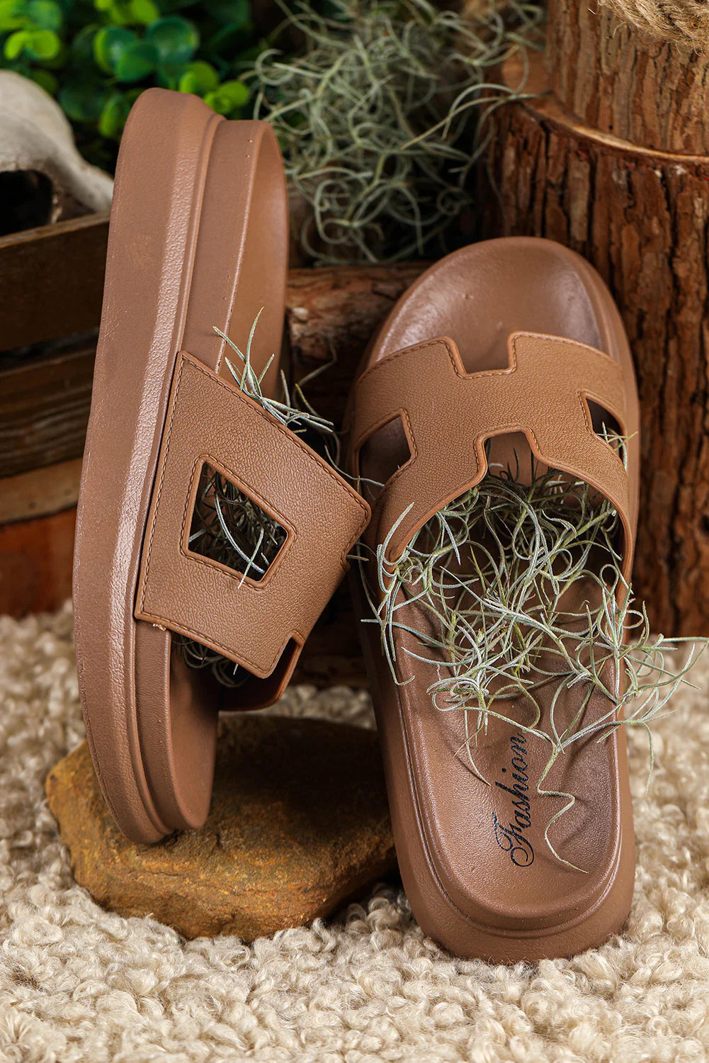 Detail shot of platform sole construction with cushioned footbed and smooth finish throughout