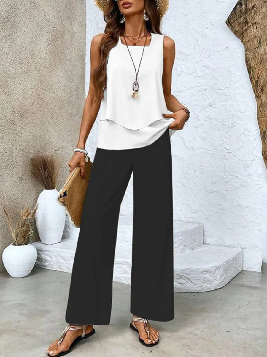 Side view of women's two piece set showing scalloped hem detail on sleeveless top
