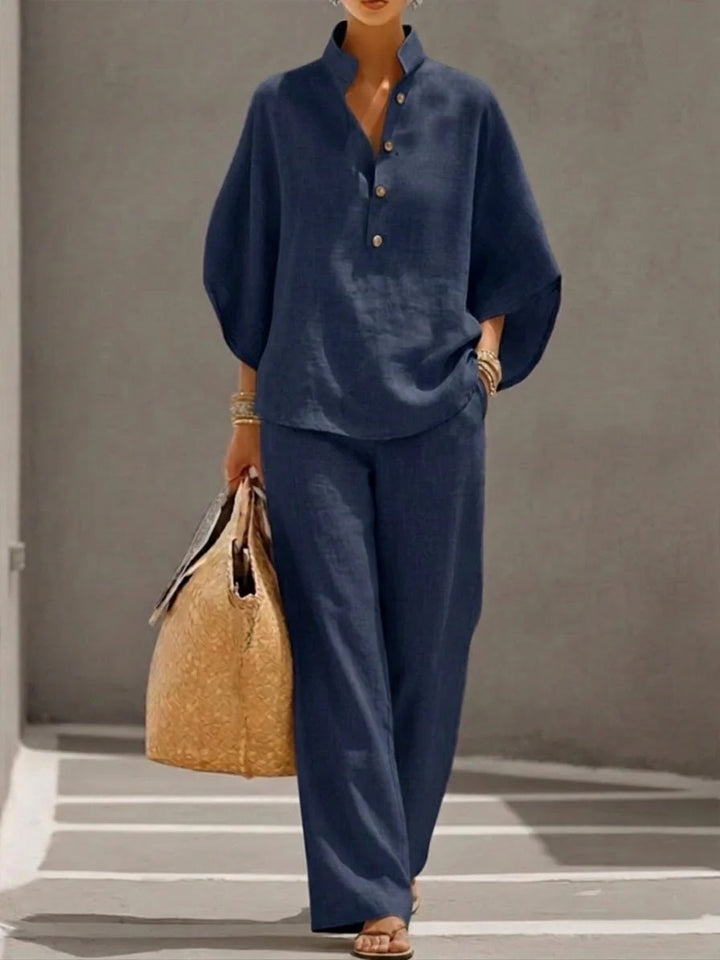 Detail of batwing sleeves and mid-rise waist on women's two-piece set
