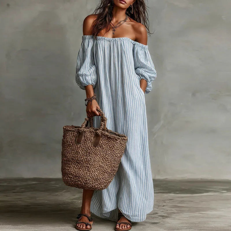 Off shoulder dress in motion showing lightweight fabric drape and maxi hem