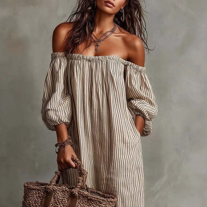 Full length view of maxi off shoulder dress with vertical stripes and gathered sleeves