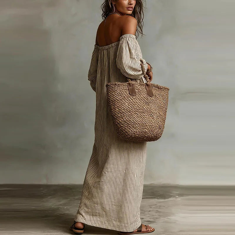 Back view of off shoulder dress showing elastic band and relaxed fit through body