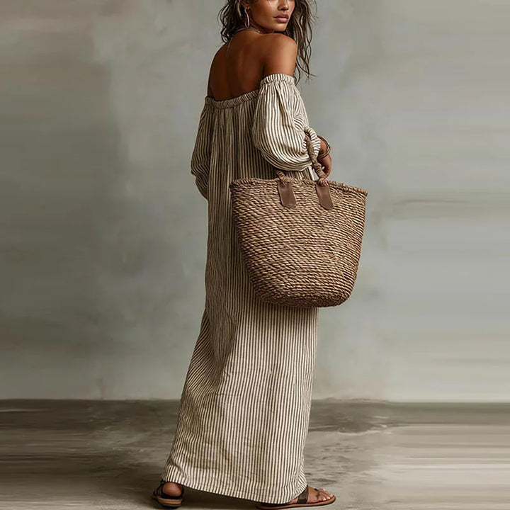 Back view of off shoulder dress showing elastic band and relaxed fit through body
