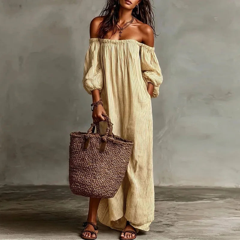 Front view of striped off shoulder dress with puff sleeves and elastic neckline