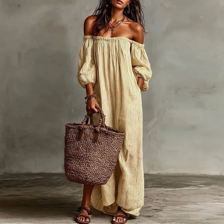 Front view of striped off shoulder dress with puff sleeves and elastic neckline
