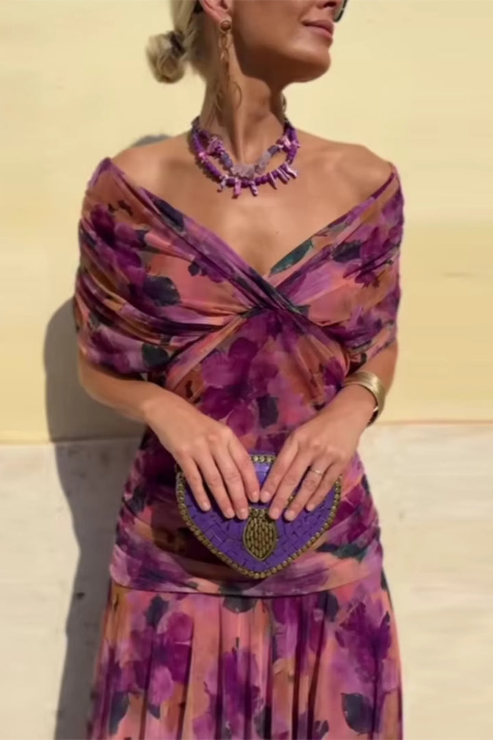 Sleeve detail on maxi ceremony dress showing sheer mesh overlay and drape