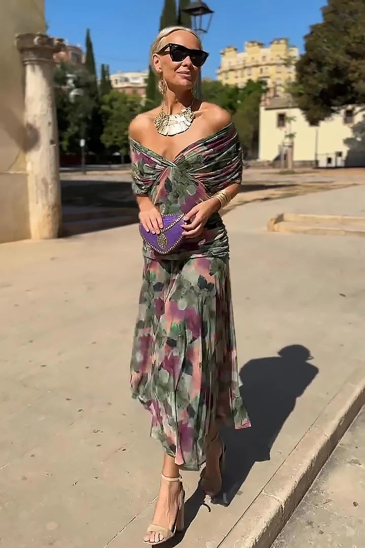 Full-length view of flowing maxi ceremony dress with floor-grazing hem and elegant drape