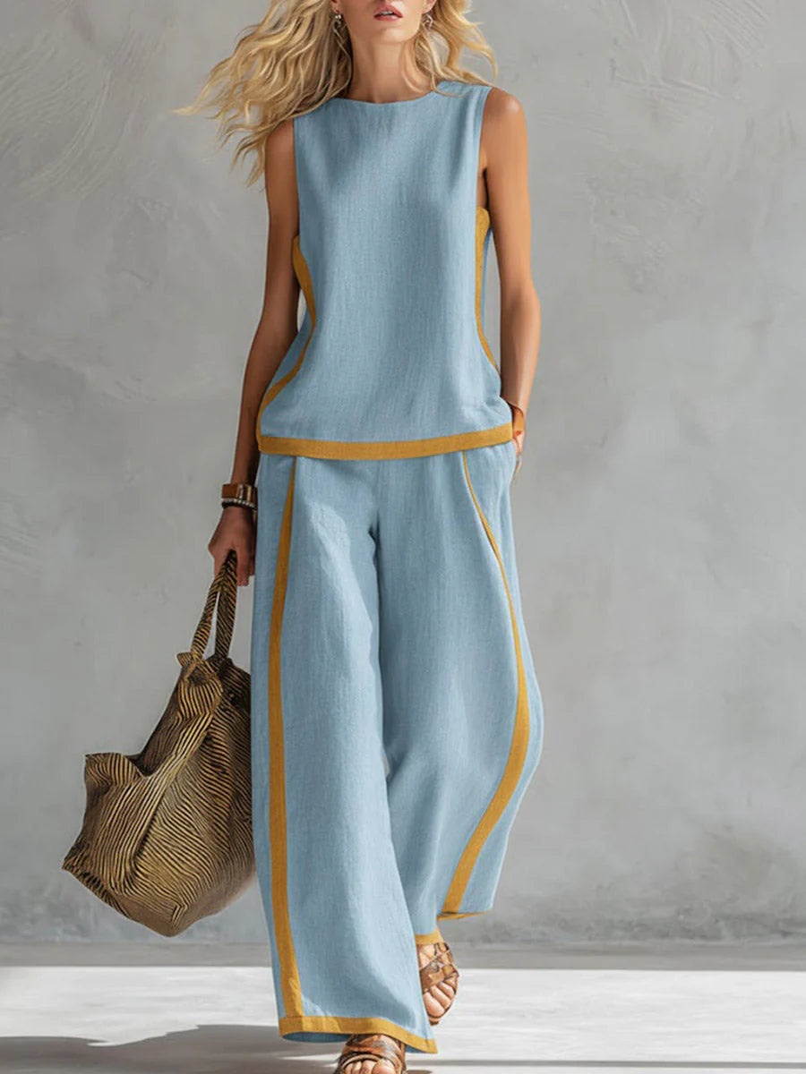 Back view of women's casual outfit set with wide-leg pants and sleeveless top in gray