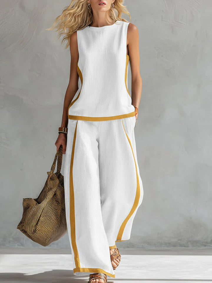 Close-up of contrast trim detailing and textured fabric on women's casual pants set