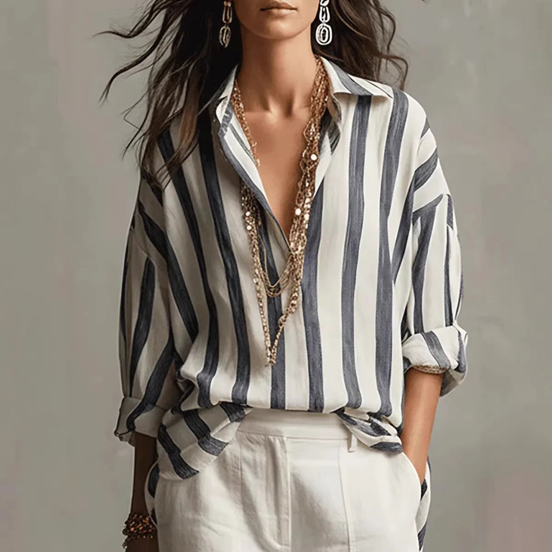 Women's linen dress shirt with vertical stripe pattern and relaxed fit for casual styling