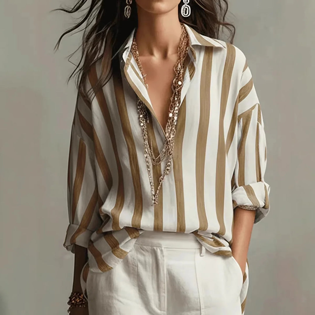 Close-up view of striped linen dress shirt showing turn-down collar and button-front closure detail