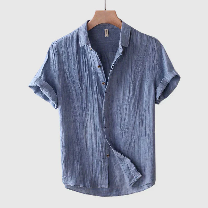 Side angle of Men's Breathable Linen Button-Down Shirt Smart Casual displaying relaxed fit and short sleeve cut