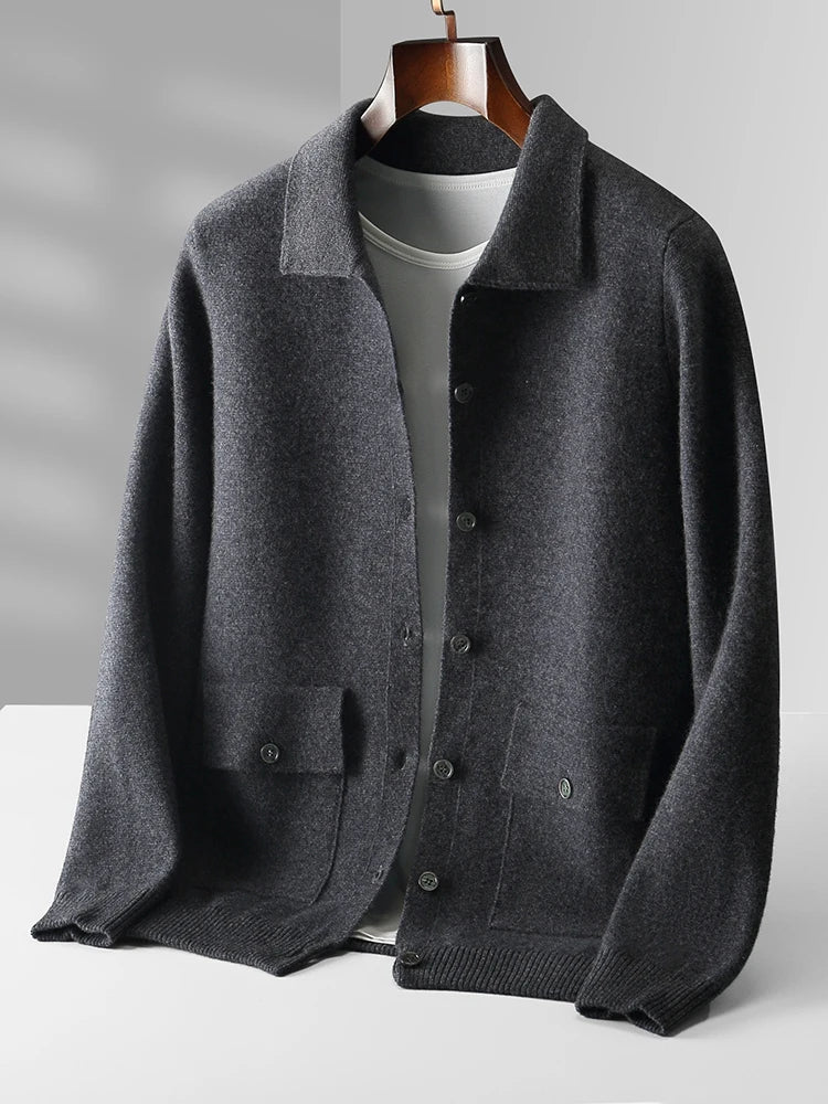 Men's knit cardigan showing dual chest pockets with button closures and smooth fabric texture