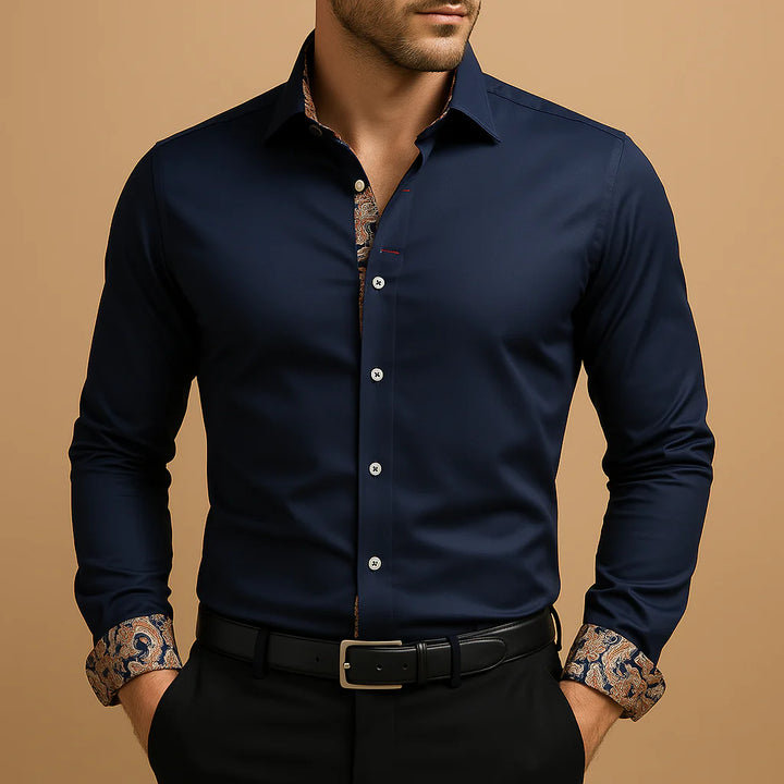 Men's fitted dress shirt with button-front closure and contrast collar lining visible at neckline