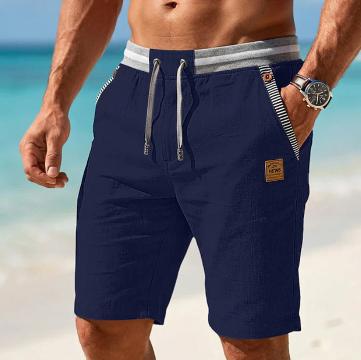 Detail shot of drawstring waistband and structured fabric on men's casual chino shorts