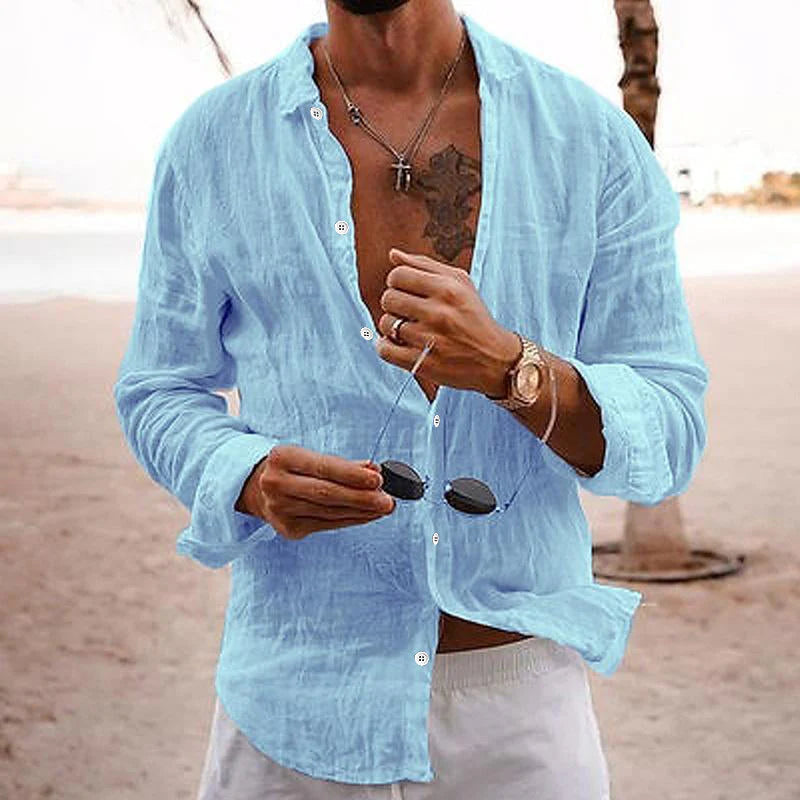 Detail of men's button-front shirt cuff and sleeve construction in gray tone