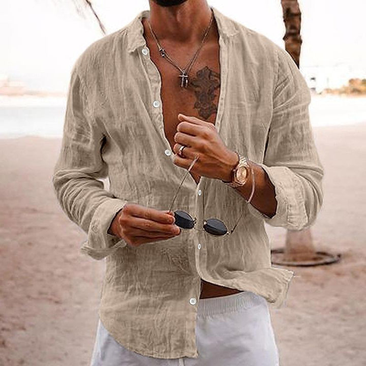 Man styling men's long sleeve casual shirt open over white pants