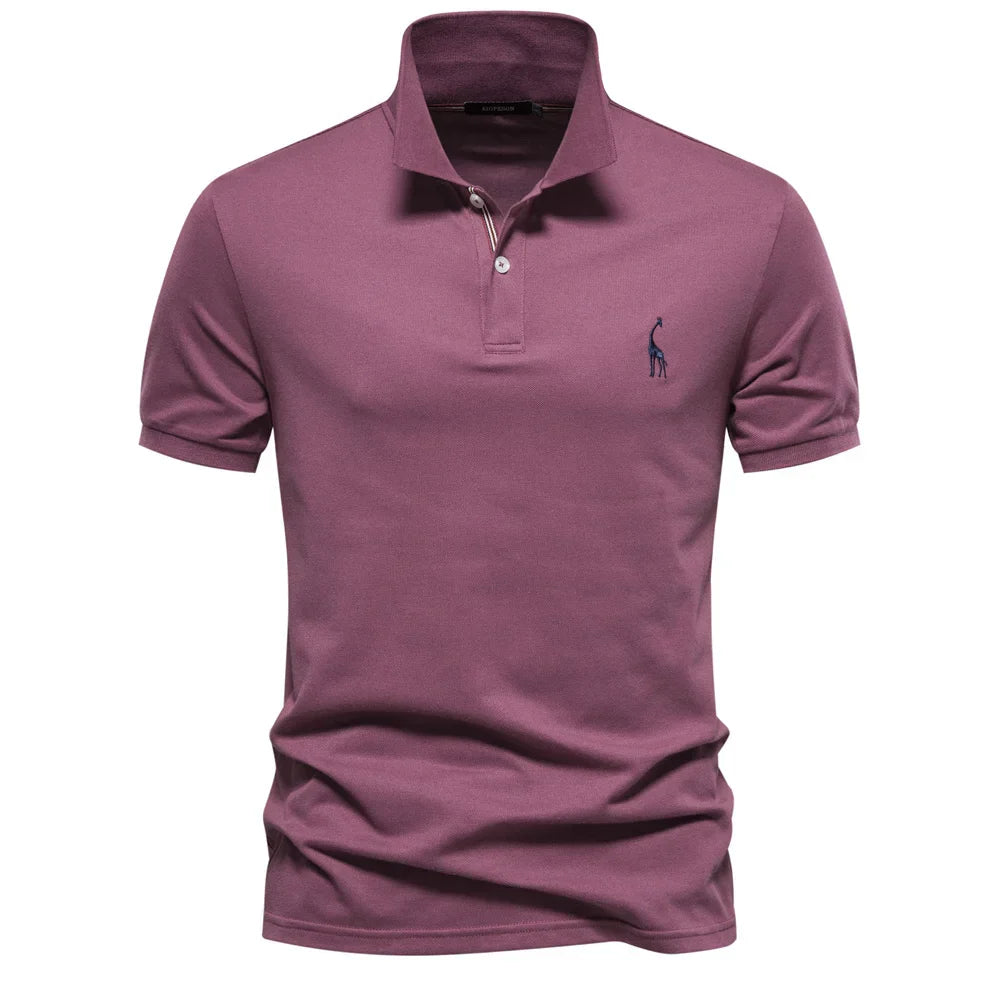 Men's short-sleeve polo shirt embroidered with chest logo in dusty purple featuring pointed collar and two-button placket