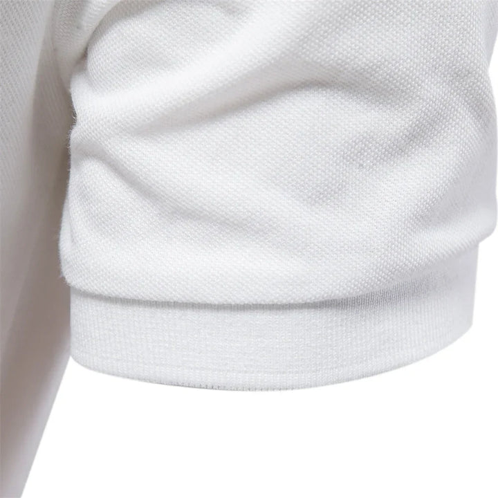 Men's embroidered polo shirt in dusty purple showcasing fitted sleeve bands and clean hem