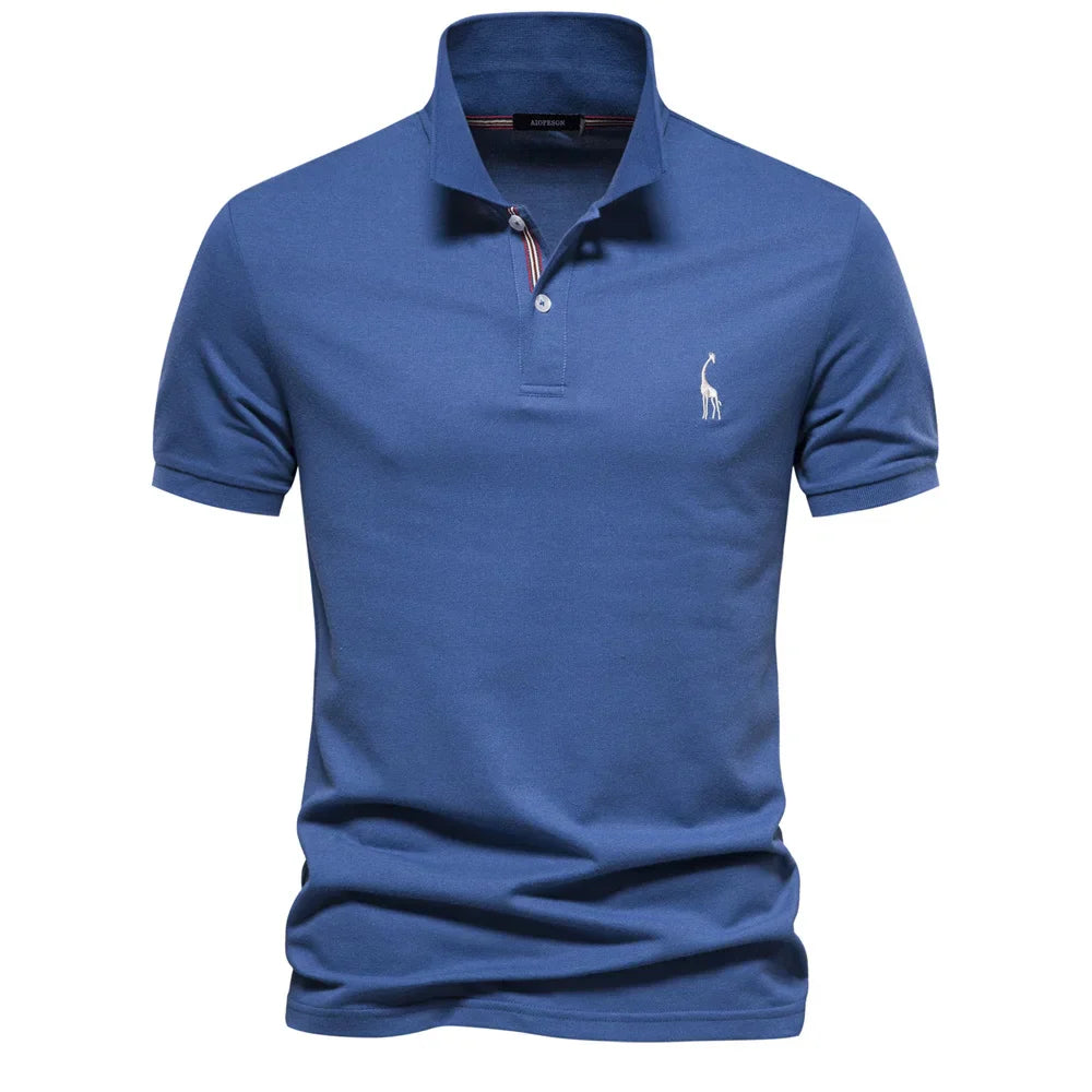 Side angle of men's polo shirt embroidered with logo displaying structured silhouette and short sleeves