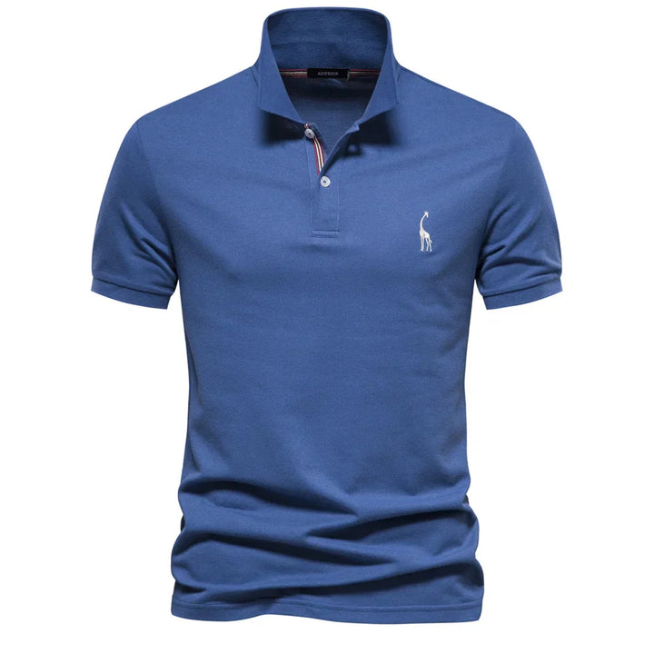 Side angle of men's polo shirt embroidered with logo displaying structured silhouette and short sleeves
