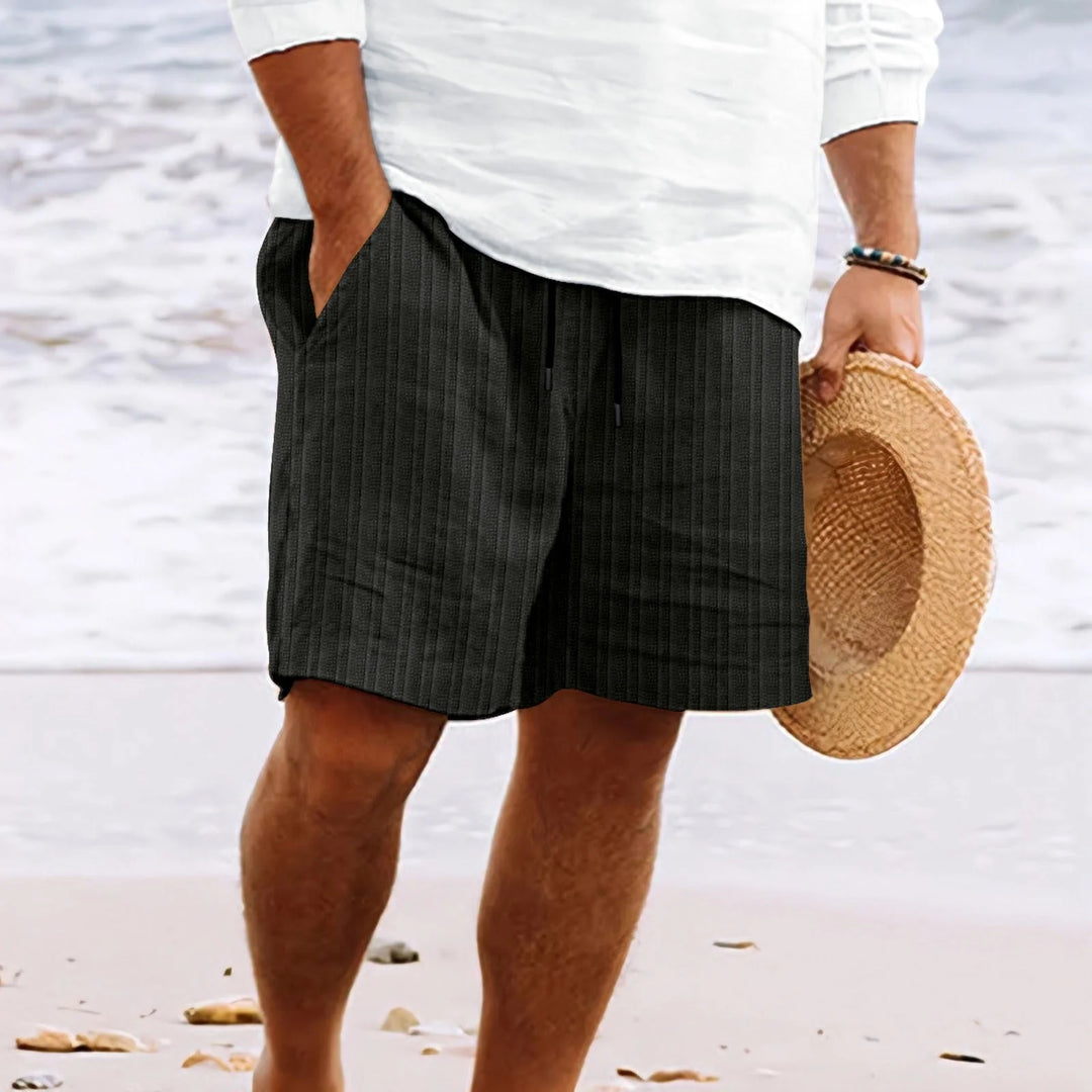 Back view of men's drawstring chino shorts highlighting relaxed cut and practical design for warm weather