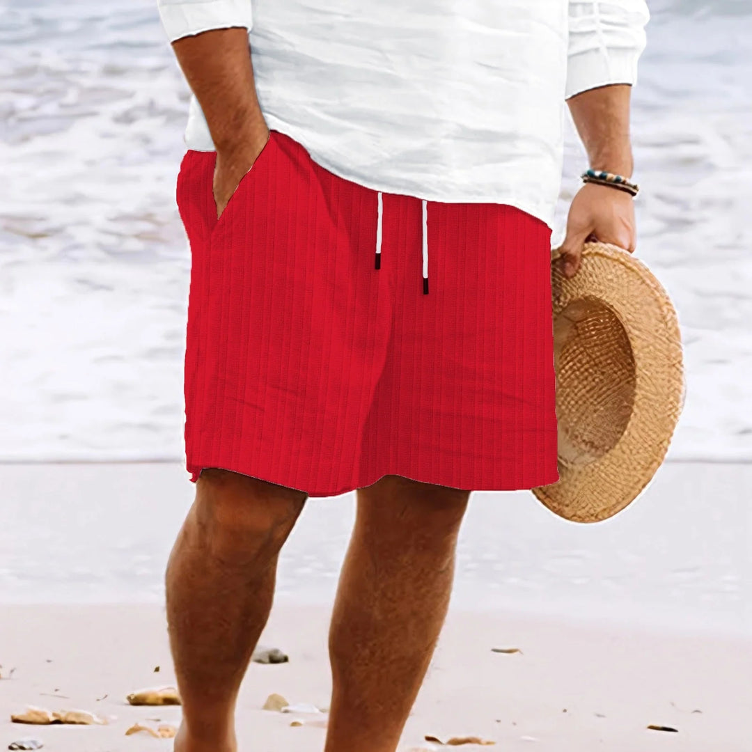 Full-length view of men's white chino shorts with textured fabric and adjustable waist for versatile styling